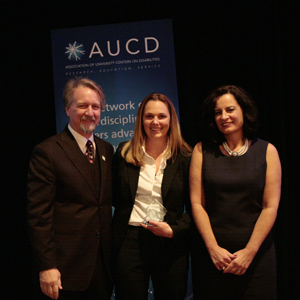 Shea Obremski (center) receives the 2009 Anne Rudigier Award with AUCD President Michael Gamel McCormick (left) and AUCD President-Elect Tamar Heller (right)