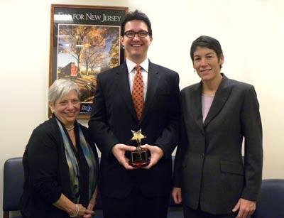 Michael Barnard (center) accepts the 2011 AUCD Gold Star with NJ UCEDD Director Deborah Spitalnik and AUCD Legislative Director Kim Musheno