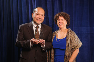 Award recipient Glen Fujiura and AUCD Board President Leslie Cohen