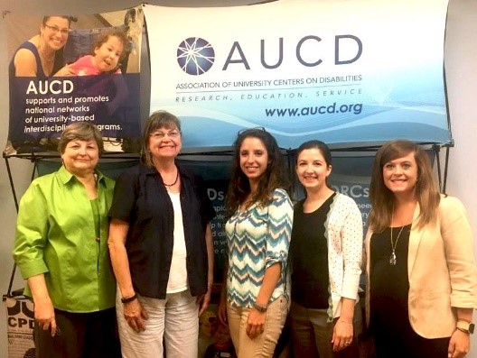 AUCD staff standing with with Nutrition ambassadors.