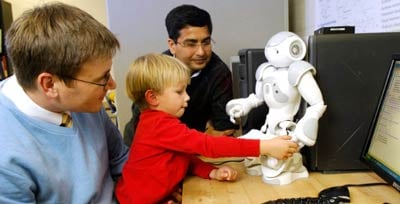 Researchers Zachary Warren and Nilanjan Sarkar are developing emotion-sensing robotic technology for use with people with autism spectrum disorder. (Anne Rayner / Vanderbilt)