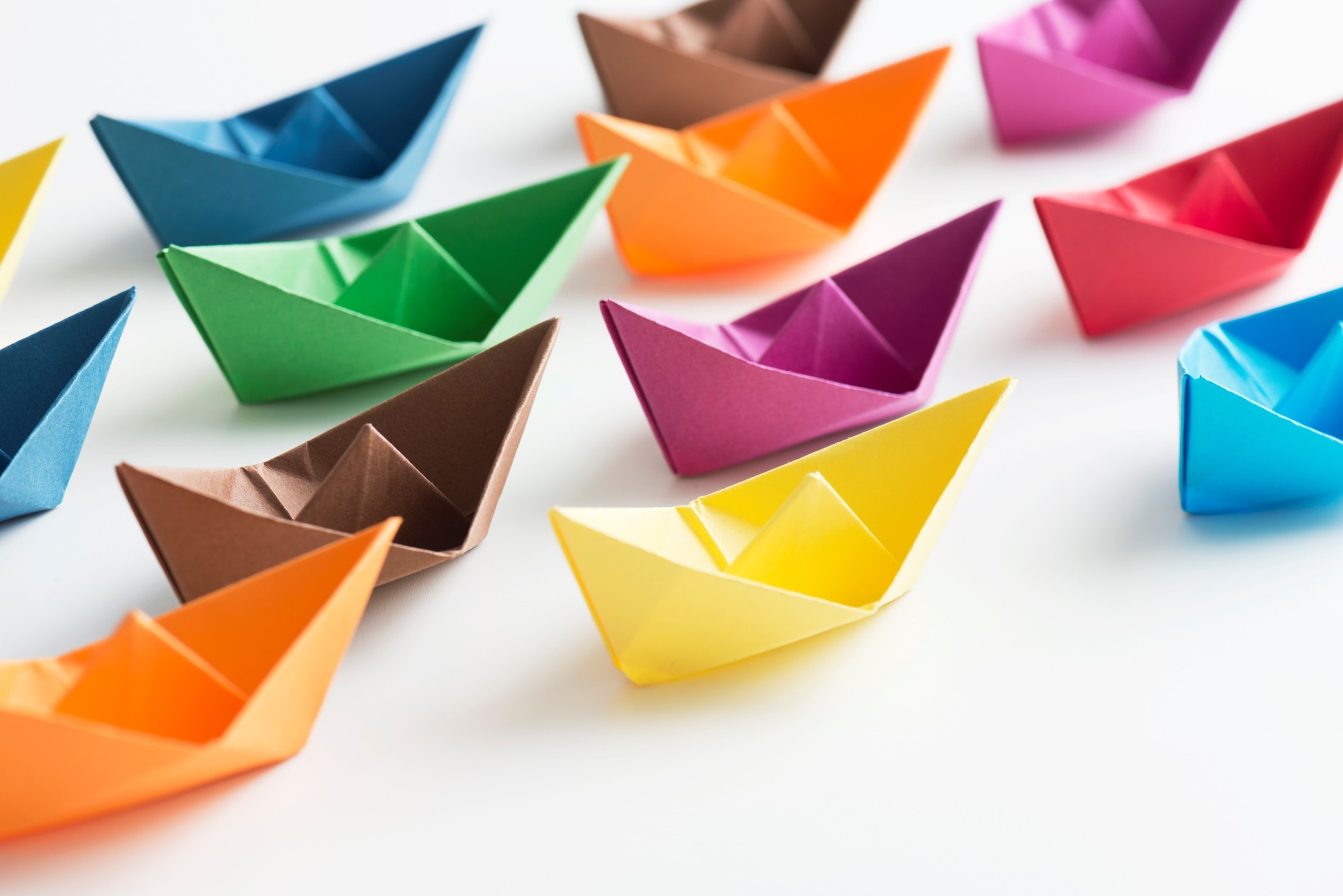 Sail boat origami in different colors
