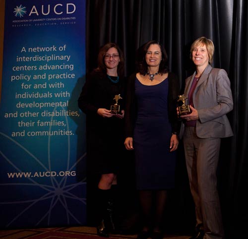 Lisa Bernhardt and Adrienne Hallett accept their 2010 AUCD Gold Star Awards