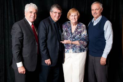 From left: AUCD President Dan Crimmins, AUCD President-Elect Tony Antosh, Patty Smith, and Nebraska's Joe Evans