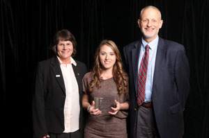 Ashley Candalaria (center) with HDI Director Harold Kleinert (R) and AUCD President Julie Fodor (L)