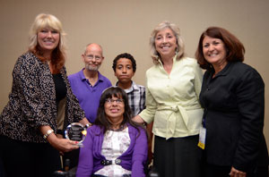 Santa Perez (seated) with (from left): Sherry Manning, Executive Director of the Nevada DD Council; Timothy Brown; Noah Perez; Rep. Dina Titus (D-NV); Donna Meltzer, CEO of NACDD. Photo courtesy of Capitol Media USA for NACDD.