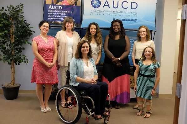 AUCD staff standing with with Nutrition ambassadors.