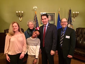 left to right; Brigit and JD Frank, Family Voices of WI and LEND graduate; Elizabeth Hecht, UCEDD; Governor Scott Walker; Dan Idzikowski, Disability Rights Wisconsin