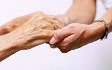 Image of two hand holding each other