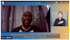 Screenshot of a video of a bald black man speaking to the camera alongside a picture within a picture of a sign language interpreter.