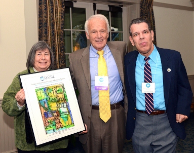 Founding Director Lu Zeph (left) and CAC member Paul Picard (far right) present the Public Policy Change Award to David Noble Stockford. (Photo by Kathy Rice)