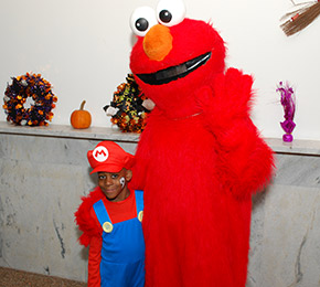 Mario Meets Elmo, Photo from the Halloween Party, Courtesy of CERC at the RFK Center