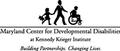 MCDD logo. Text: Maryland Center for Developmental Disabilities at Kennedy Krieger. Building Partnerships. Changing Lives.