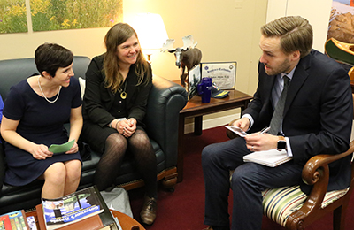 AUCD Emerging Leaders meeting with hill staffers in a senator's office.