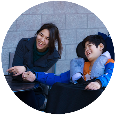 Image of two young adults laughing.