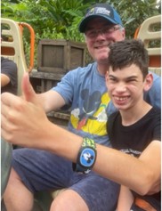 Tyler with his fahther taking a selfie. 