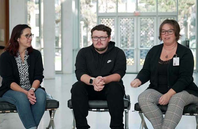 (L-R) Independent facilitator Trisha Fenby, supports services recipient Tim Shute, and case manager Renee Busby.