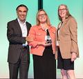 Dr. Sanjeev Arora, Project ECHO Founder and Executive Director, presents award to Canyon Hardesty, WIND Associate Director, with Dr. Karla Thornton, Senior Associate Director of Project ECHO